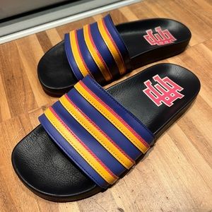 Eric Emanuel x Adidas Adilette Legion Ink / Sonic Ink - Sonic Gold - blue slides